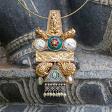 Long statement pendant handcrafted with unique elements