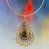Beautiful pendant embellished with Labradorite stone in the center surrounded with garnet and amethyst on hasli