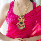 Statement necklace studded with green Jade stone and pearls