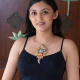 An antique finish temple neckpiece with godlike eyes and sword ( Temple Collection)