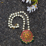 Temple pendant with kemp and semi precious stones on pearls string