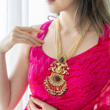 Statement necklace studded with Ruby stone and pearls