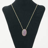 Dainty neckpiece with pearls, silver, and pink moss agate stone
