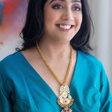 Long statement gold-plated necklace with kundan and green onyx stone