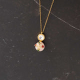 Beautiful handcrafted neckpiece with a round Rose quartz and kundan pendant