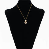 Beautiful handcrafted neckpiece with a round Rose quartz and kundan pendant