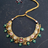 Gold plated necklace with beautiful kundan embellishment and hanging green onyx with embedded turquoise drops
