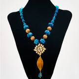 Statement necklace made with onyx beads, brass and kundan
