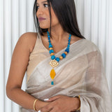 Statement necklace made with onyx beads, brass and kundan