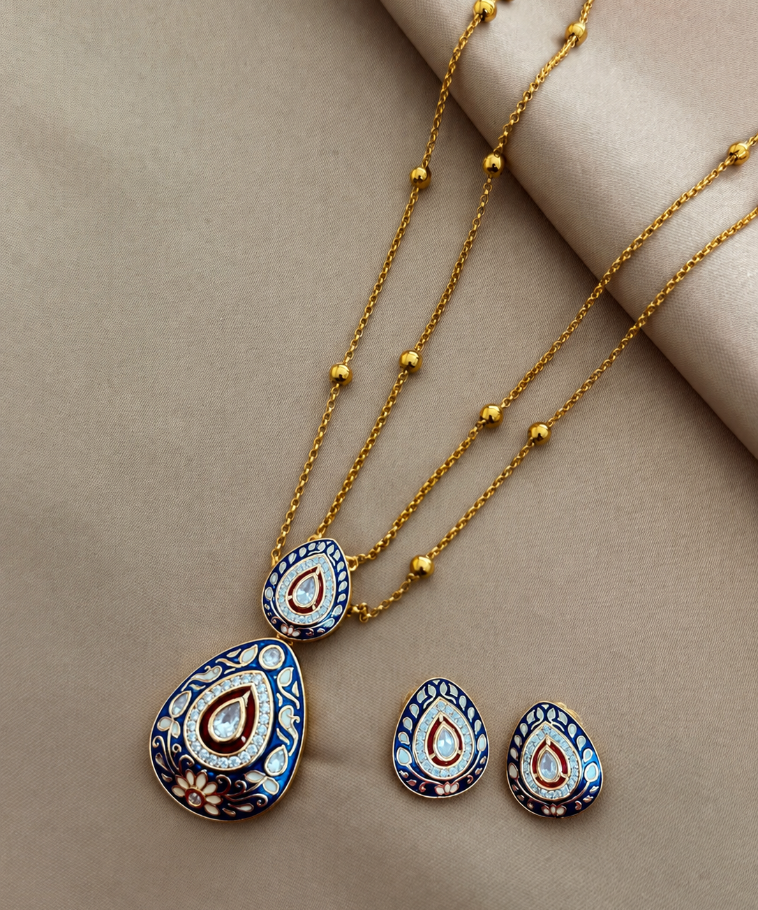Kundan red drop cut Pendant set