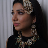 Adorned with pearls and gold detailing