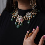 Adorned with pearls and gold detailing