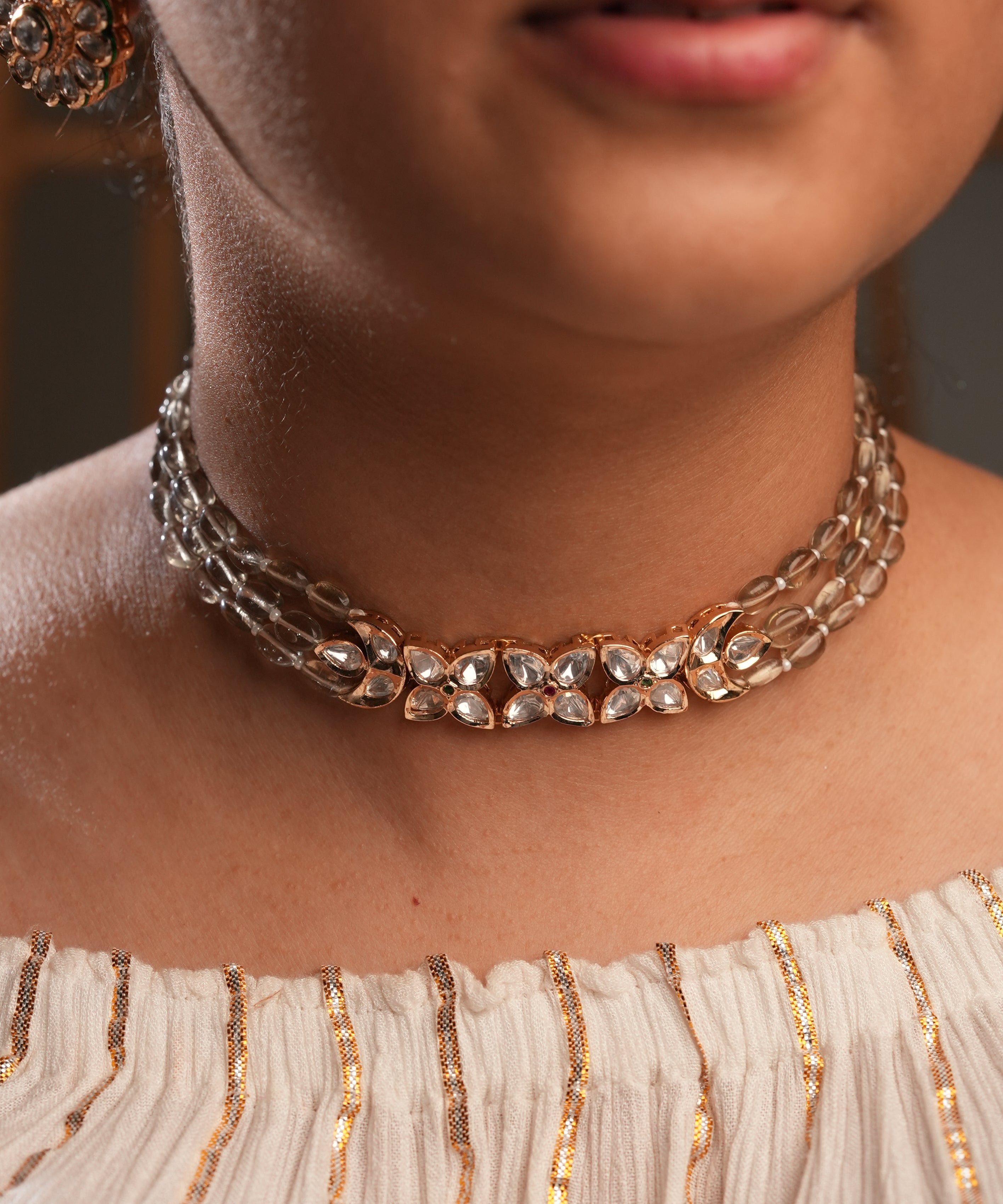Stone chain with Kundan tri-flower choker
