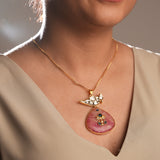 Pink Quartz and White Kundan and a stone-studded half moon chain and pendant