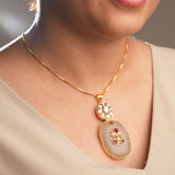 Pink Quartz and White Kundan and a stone-studded chain and pendant