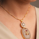 Pink Quartz and White Kundan and a stone-studded chain and pendant