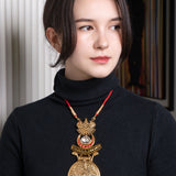 Lunar Grace Temple Necklace: Temple necklace with moon motifs - Avasa Collection