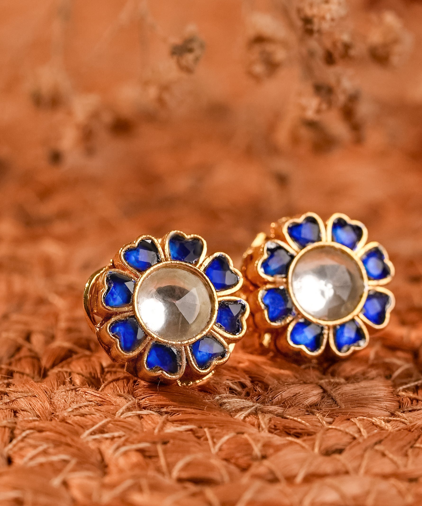 Signity glow Heart Shaped Flowers Kundan Shell Earrings