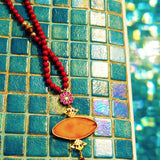 Hand-crafted Orange agate pendant