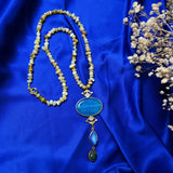 A stunning turquoise agate pendant in a beaded Long Chain