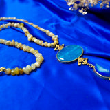 A stunning turquoise agate pendant in a beaded Long Chain
