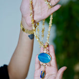 A stunning turquoise agate pendant in a beaded Long Chain