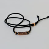 African brass in balck silk thread