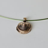 silver color pendant on wire