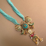 Himalayan Serenity: Sky Blue Thread Necklace with Tibetan Pendant & Jewel-Adorned Jhumki Drops" - Isaana Collection