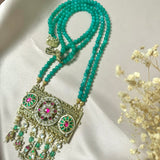 Stunning Gold pendant with Kundan ornate motifs