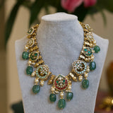Adorned with pearls and gold detailing
