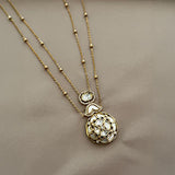 Lustrous layered kundan pendant set