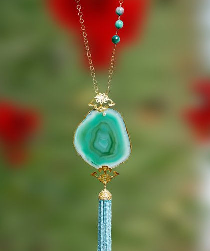 A stunning aqua green agate pendant