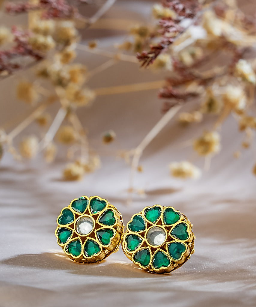 Signity glow Heart Shaped Flowers Kundan Shell Earrings